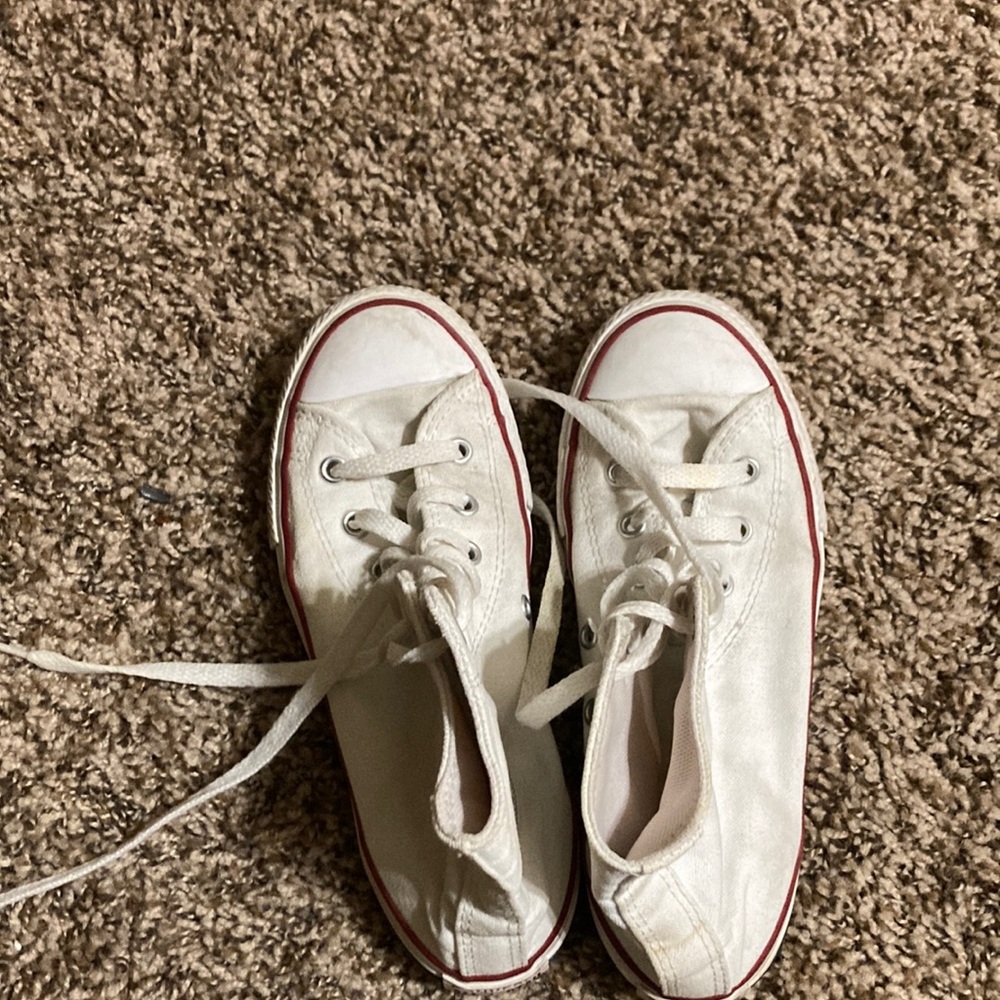White converse shoes.
